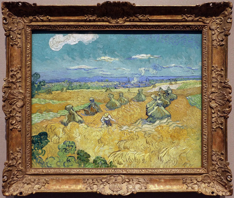 Tarweveld met schoven en maaidorser - Vincent van Gogh