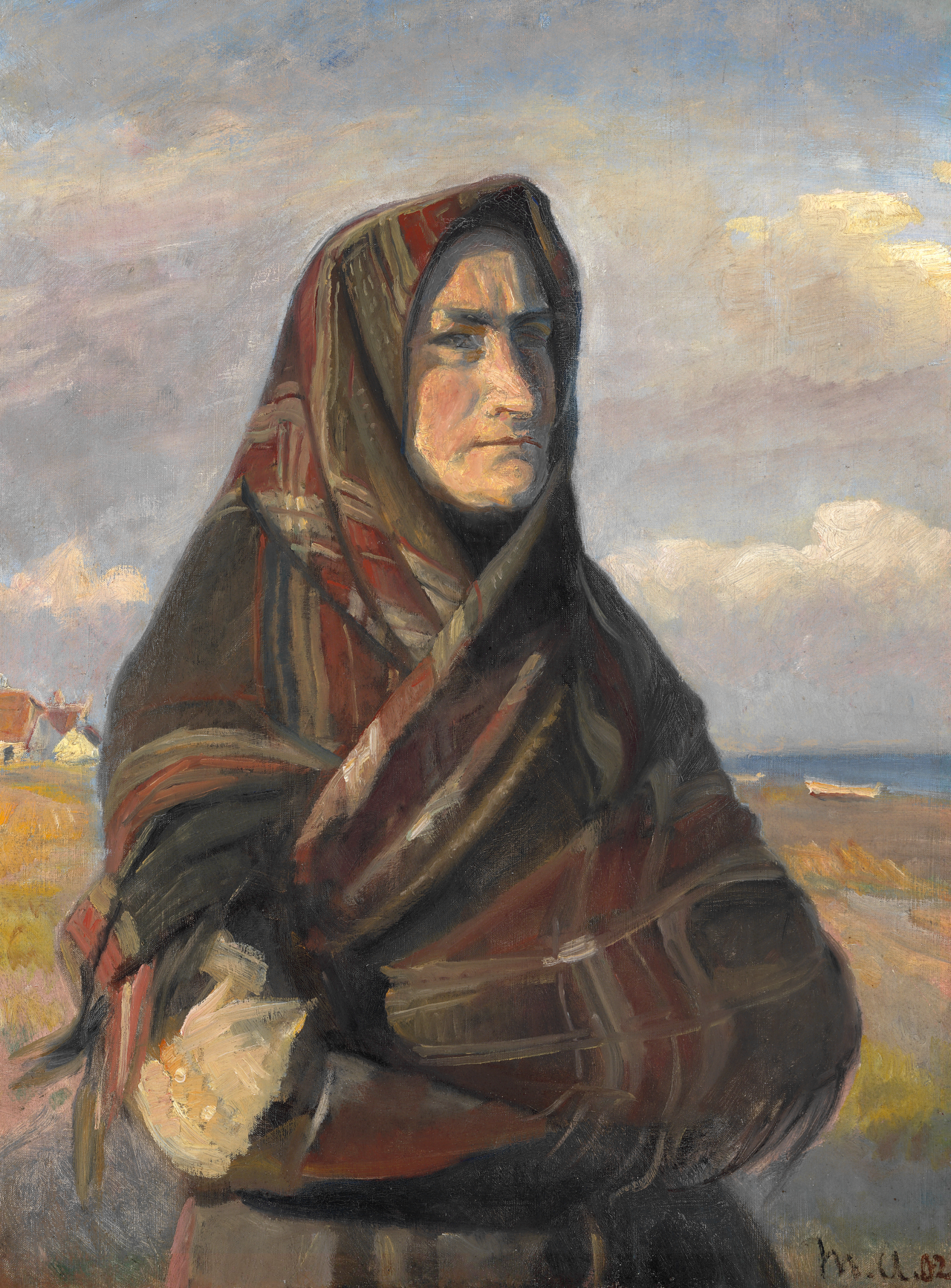 Une femme de pêcheur vêtue d’un châle à carreaux se tient dans les dunes près de Skagen et regarde la mer. - Michael