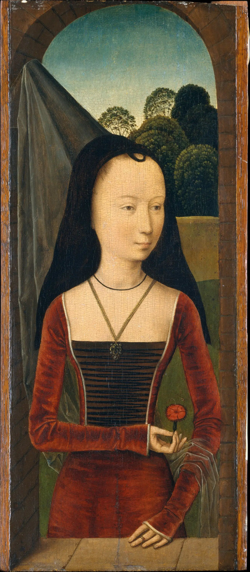 Jonge vrouw met een roos - Hans Memling