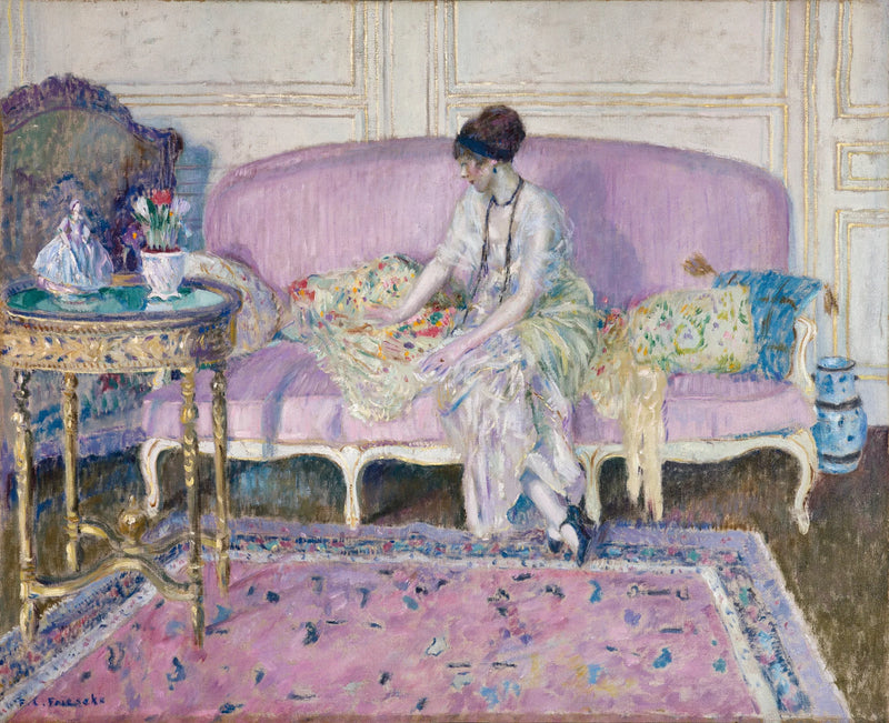 Vrouw zittend op een bank binnen - Frederick Carl Frieseke