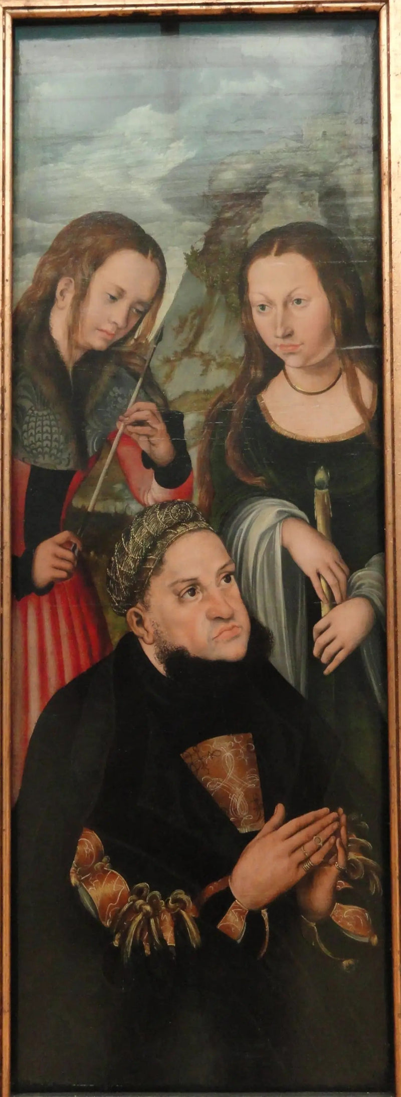 De kiezer Frederik de Wijze van Saksen (1463-1525) met de heilige Ursula (links) en Geneviève (rechts) - Lucas Cranach de Oude