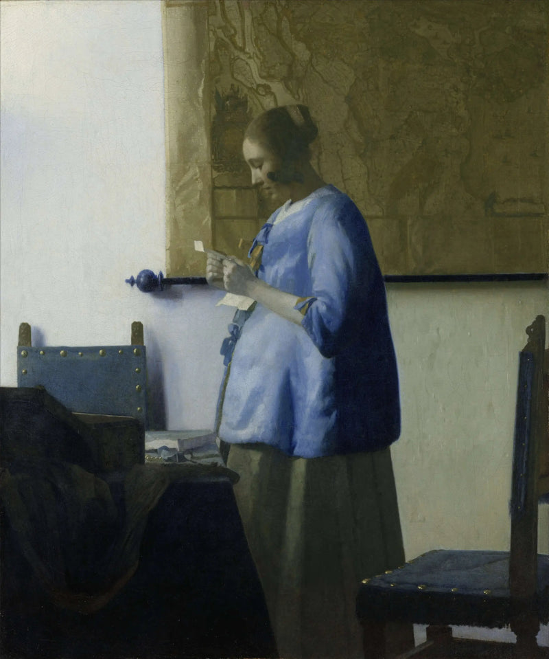De Vrouw in het blauw die een brief leest - Johannes Vermeer