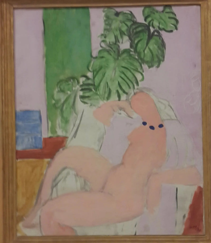 Nu in een fauteuil, groene plant - Henri Matisse