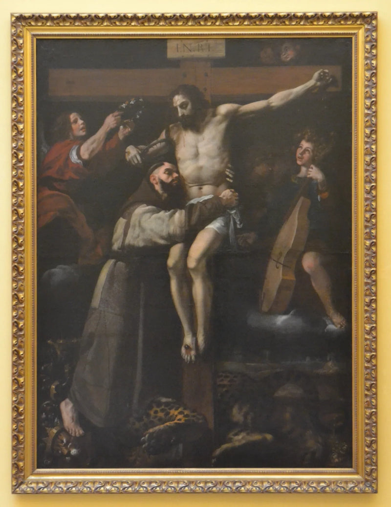 Sint Franciscus van Assisi die de Christus aan het kruis kust - Francisco Ribalta