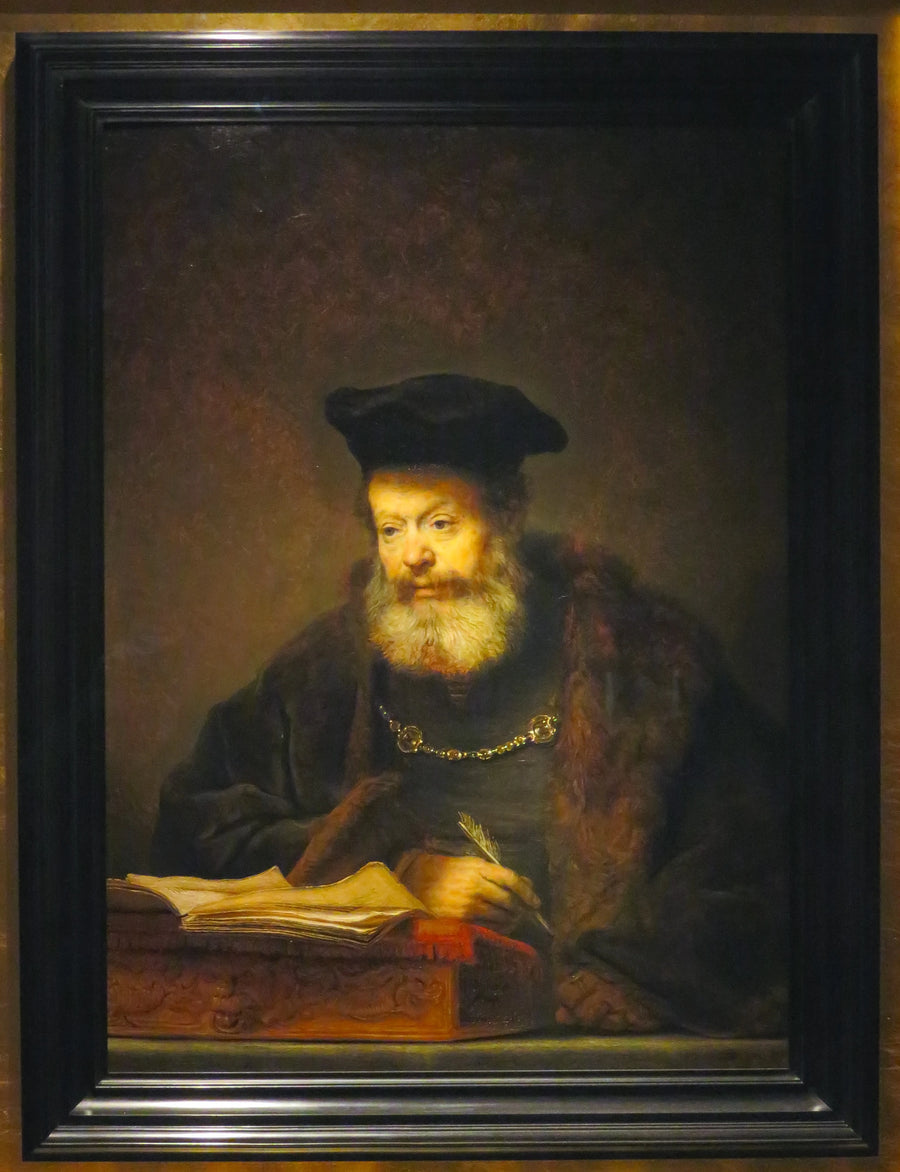 Erudiet aan zijn bureau - Rembrandt