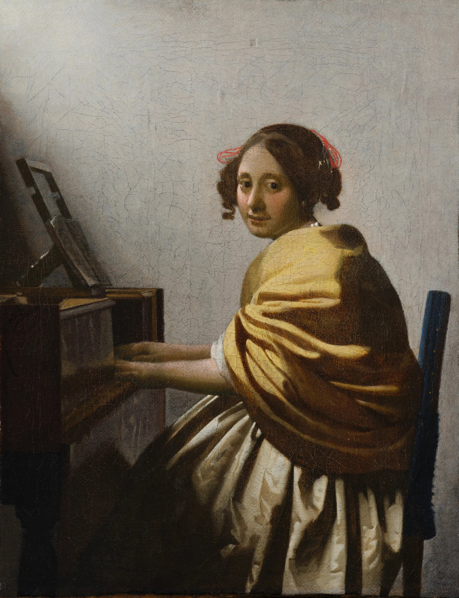 Dame zittend aan het virginaal - Johannes Vermeer